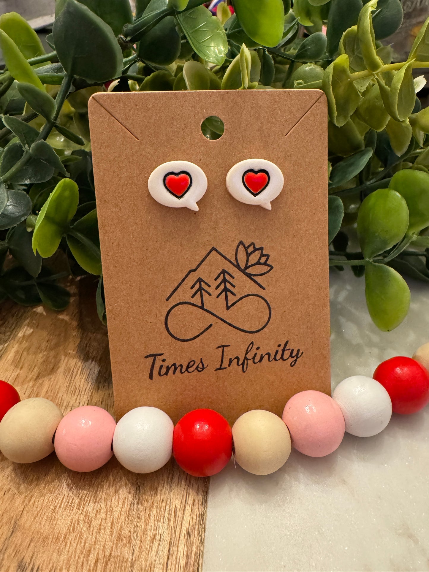 Give love heart studs